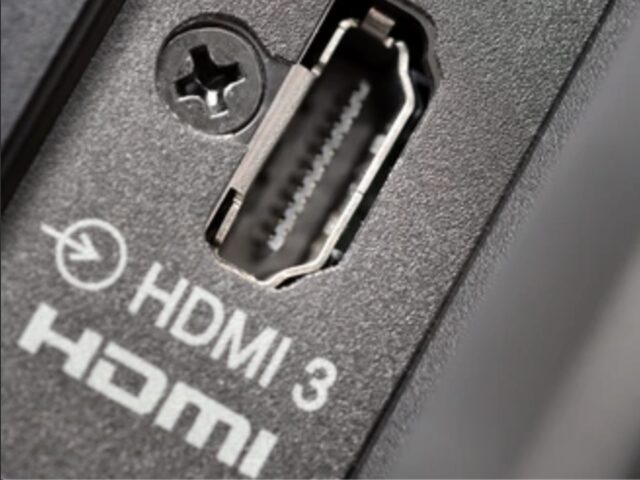 Close-up of a real HDMI socket on the back of a television, labelled HDMI 3